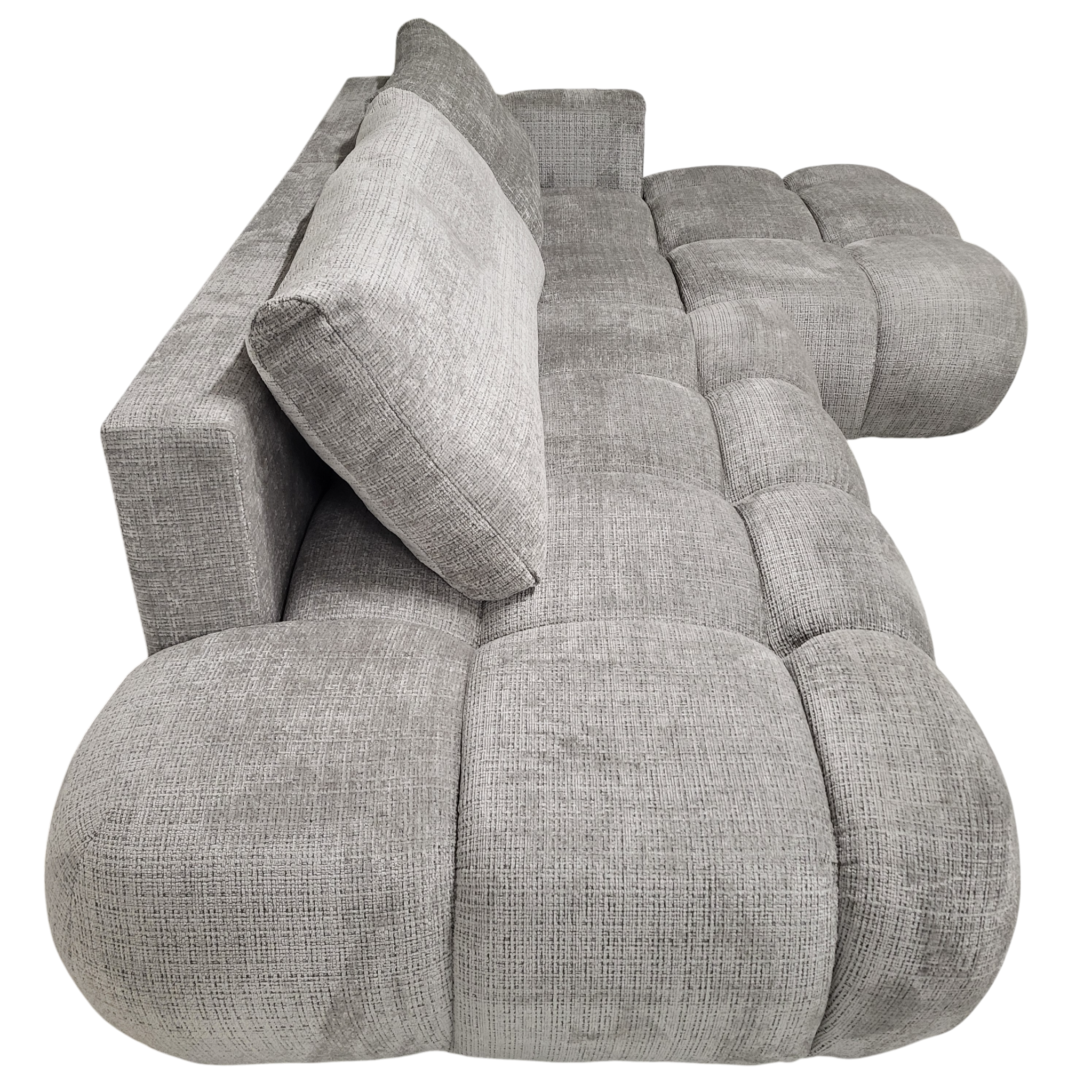 Vue latérale du canapé Milano avec dossier rembourré